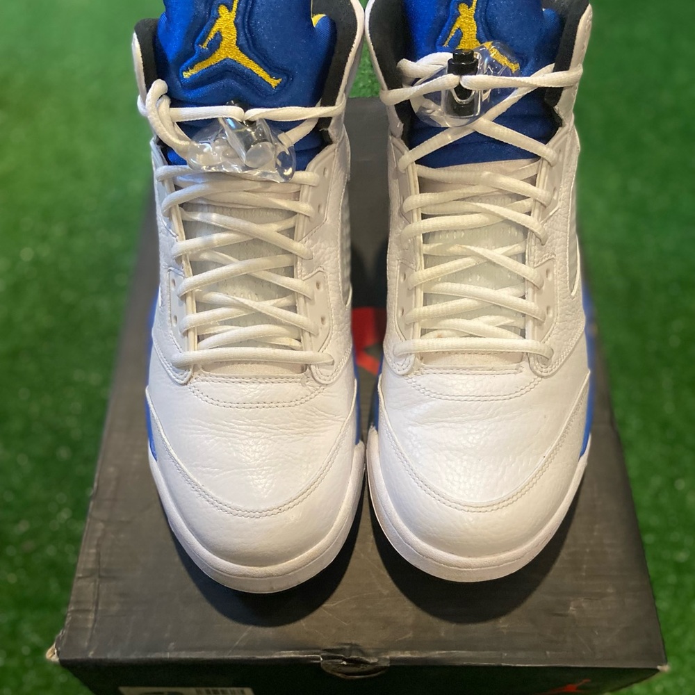 White and Blue Sneakers with Yellow Accents